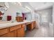 Bathroom with a double vanity, shower, and garden tub at 11314 Misty Isle Ln, Riverview, FL 33579
