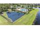 Community playground with swings and slides at 11314 Misty Isle Ln, Riverview, FL 33579
