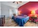 Main bedroom with a king-size bed and ample closet space at 11314 Misty Isle Ln, Riverview, FL 33579