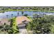 Single-Gathering home with lake view in a quiet residential neighborhood at 11314 Misty Isle Ln, Riverview, FL 33579