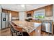 Modern kitchen with stainless steel appliances and island at 109 N Saint Thomas Cir, Apollo Beach, FL 33572