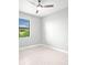 Bright bedroom with ceiling fan and neutral decor at 5217 Forbes Ter, Port Charlotte, FL 33981