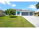 Beautiful two-story home with three-car garage and paver driveway at 5217 Forbes Ter, Port Charlotte, FL 33981