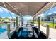 Covered boat lift on private dock at 5217 Forbes Ter, Port Charlotte, FL 33981