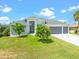 Beautiful two-story home with three-car garage and paver driveway at 5217 Forbes Ter, Port Charlotte, FL 33981