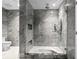 Spa-like bathroom with large walk-in shower and gray tile at 2912 W Santiago St # 2104, Tampa, FL 33629