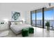 Main bedroom with water view and luxurious bedding at 2912 W Santiago St # 2104, Tampa, FL 33629