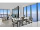 Bright dining room with water views and modern table at 2912 W Santiago St # 2104, Tampa, FL 33629