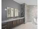 Modern bathroom with double sinks and marble finishes at 2912 W Santiago St # 2104, Tampa, FL 33629