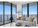 Spacious living room with large windows and water view at 2912 W Santiago St # 2104, Tampa, FL 33629