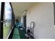 Covered patio with water views and storage at 8818 Bay Pointe Dr # 108, Tampa, FL 33615