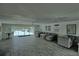Spacious common area with comfortable seating and pool access at 8818 Bay Pointe Dr # 108, Tampa, FL 33615