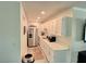 Small galley kitchen with stainless steel appliances at 8818 Bay Pointe Dr # 108, Tampa, FL 33615