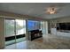 Living room with water views and access to patio at 8818 Bay Pointe Dr # 108, Tampa, FL 33615