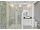 Spa-like bathroom featuring a large walk-in shower and contemporary fixtures at 567 Bimini Bay Blvd, Apollo Beach, FL 33572