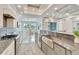 Modern kitchen with stainless steel appliances and an island at 567 Bimini Bay Blvd, Apollo Beach, FL 33572