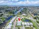Wide aerial view showcasing the property's location near the waterfront at 567 Bimini Bay Blvd, Apollo Beach, FL 33572