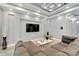 Modern media room featuring a large TV and comfortable seating at 567 Bimini Bay Blvd, Apollo Beach, FL 33572