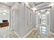 Modern hallway with recessed lighting and unique wall design at 567 Bimini Bay Blvd, Apollo Beach, FL 33572