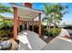 Community clubhouse entrance with columns and landscaping at 567 Bimini Bay Blvd, Apollo Beach, FL 33572