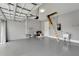 Bright and spacious garage with attic access and utility area at 567 Bimini Bay Blvd, Apollo Beach, FL 33572