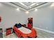 Themed bedroom with race car bed and built-in storage at 567 Bimini Bay Blvd, Apollo Beach, FL 33572