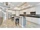 Modern kitchen with white cabinets and granite countertops at 567 Bimini Bay Blvd, Apollo Beach, FL 33572