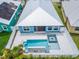 Aerial view showing home, pool, and surrounding neighborhood at 567 Bimini Bay Blvd, Apollo Beach, FL 33572