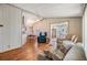 Open concept living area with hardwood floors and dining area at 37743 Mission Hills Ave, Zephyrhills, FL 33541
