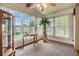 Sunroom with ample natural light and window seating at 37743 Mission Hills Ave, Zephyrhills, FL 33541
