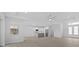 Spacious living area with an open floor plan and lots of natural light at 6999 Burnsville St, Englewood, FL 34224