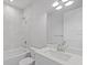 Clean bathroom with a bathtub and modern vanity at 6999 Burnsville St, Englewood, FL 34224