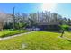 Community pool area with a pool house at 12703 Tall Pine Dr, Tampa, FL 33625