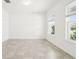 A bedroom with natural light and neutral toned walls at 4265 Big Sky Dr, Spring Hill, FL 34604