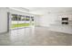 An open-concept home features sliding glass doors to bring the outside in at 4265 Big Sky Dr, Spring Hill, FL 34604