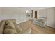 Spacious living area with hardwood floors and a view to the backyard at 4317 Honey Vista Cir, Tampa, FL 33624