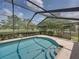 Enjoy this screened pool with tranquil views at 4317 Honey Vista Cir, Tampa, FL 33624