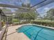 Refreshing screened pool perfect for relaxation at 4317 Honey Vista Cir, Tampa, FL 33624