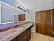 Modern bathroom with a large vanity, updated fixtures and stylish flooring at 4317 Honey Vista Cir, Tampa, FL 33624