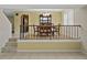 Bright dining room featuring a wood table and built-in hutch at 4317 Honey Vista Cir, Tampa, FL 33624