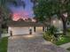 Attractive home with a brick paver driveway and well-manicured landscaping at 4317 Honey Vista Cir, Tampa, FL 33624