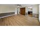 Main bedroom with wood-look floors, large closet, and ensuite bathroom access at 4317 Honey Vista Cir, Tampa, FL 33624