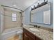 Clean bathroom with granite countertop, new vanity, and tub shower combo at 4317 Honey Vista Cir, Tampa, FL 33624
