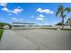 Bright community space with covered area, seating, and access to the water, perfect for relaxation and enjoying the waterfront views at 1819 Shore S Dr # 318, South Pasadena, FL 33707