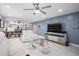 Spacious living room features tile flooring, modern furniture, and an open floor plan at 1819 Shore S Dr # 318, South Pasadena, FL 33707