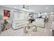 Bright living room with tile flooring and modern furniture at 1819 Shore S Dr # 318, South Pasadena, FL 33707