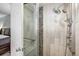 Luxurious shower featuring rainfall shower head, handheld wand, and sleek tile accents at 1819 Shore S Dr # 318, South Pasadena, FL 33707