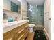 Stylishly renovated bathroom featuring a glass shower and updated vanity at 4617 John Moore Rd, Brandon, FL 33511