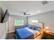 Bright bedroom with a comfortable bed and modern decor at 4617 John Moore Rd, Brandon, FL 33511