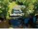 Stunning waterfront home with a spacious deck and lush landscaping at 4617 John Moore Rd, Brandon, FL 33511